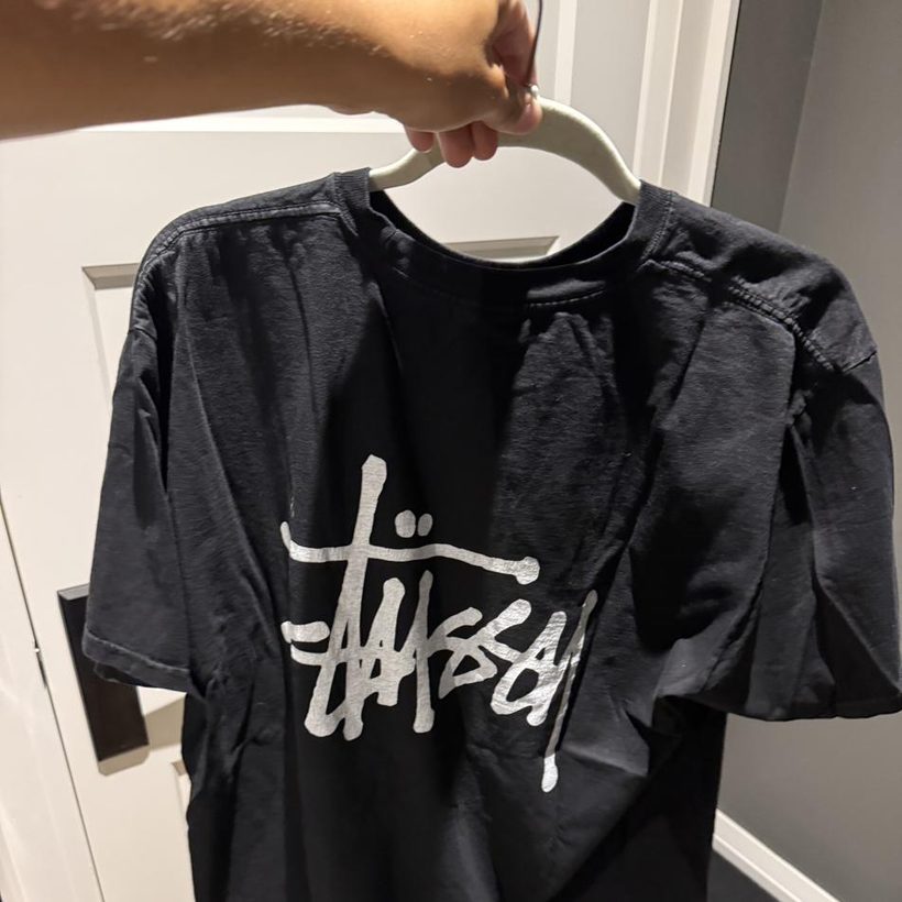 Stüssy Stock Logo Tee — Black (front & back)